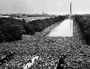 Hundreds of thousands of marchers gather around the reflecting pool in front of the Washington monument and listen as the Rev. Martin Luther King Jr. delivers his "I Have A Dream" speech from the steps of the Lincoln Memorial during the March on Washington for Jobs and Freedom in this August 28, 1963 file photo shot by U.S. Information Agency photographer Rowland Scherman and provided to Reuters by the U.S. National Archives in Washington on August 21, 2013. In the coming week, Washington will play host to an array of events marking the 50th anniversary of the march and speech. REUTERS/Rowland Scherman/U.S. Information Agency/U.S. National Archives (UNITED STATES - Tags: POLITICS ANNIVERSARY) ATTENTION EDITORS - THIS IMAGE WAS PROVIDED BY A THIRD PARTY. FOR EDITORIAL USE ONLY. NOT FOR SALE FOR MARKETING OR ADVERTISING CAMPAIGNS.THIS PICTURE IS DISTRIBUTED EXACTLY AS RECEIVED BY REUTERS, AS A SERVICE TO CLIENTS