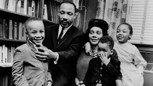 Dr. Martin Luther King Jr. and his wife, Coretta Scott King, sit with three of their four children in their Atlanta, Ga, home, on March 17, 1963. From left are: Martin Luther King III, 5, Dexter Scott, 2, and Yolanda Denise, 7.