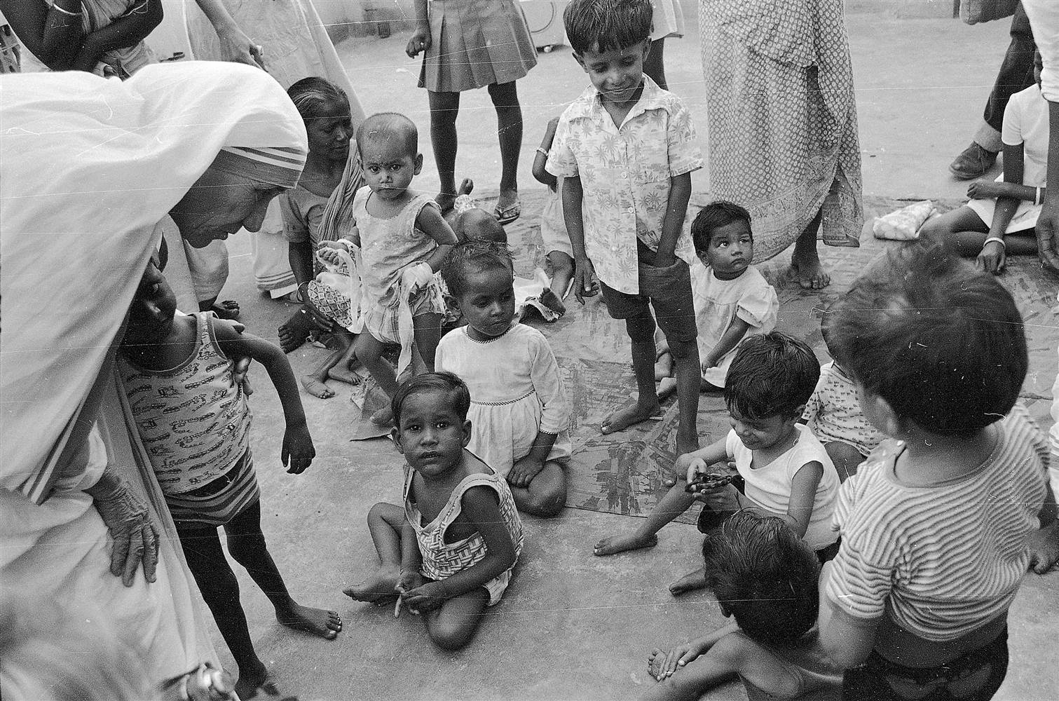 Image result for mother teresa helping people