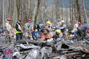 Rescuers searching for missing victims of the mudslide.