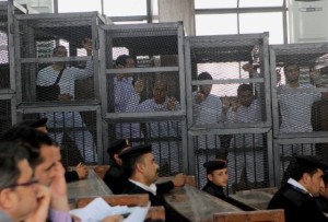 Members and supprters of the Muslim Brotherhood are contained while awaiting their sentencing in trial