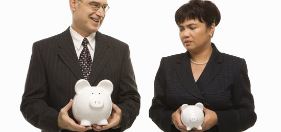 Businesspeople holding piggybanks.