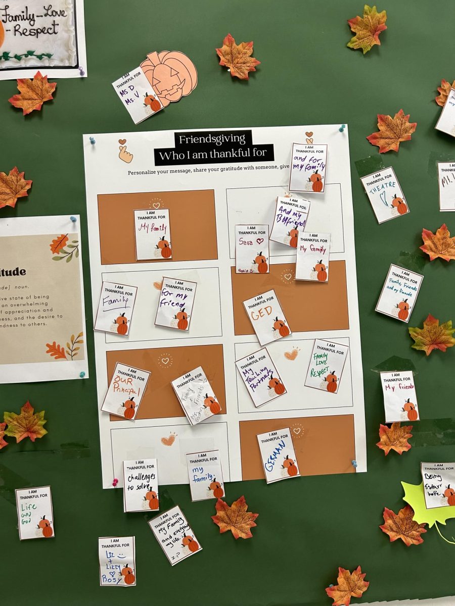 Words of Gratitude fall like leaves on the message board entering the cafeteria.  This was created by students as they arrived at the November Mentor Social. on Friday November 22nd.